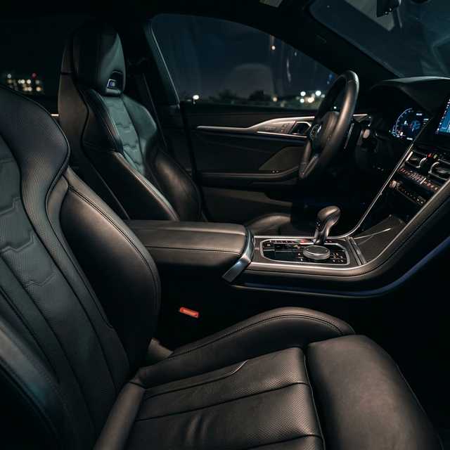 Conditioned and restored leather car seats after premium detailing